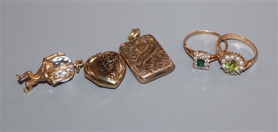 Two yellow metal and gem set rings, including 9ct gold, two lockets and a charm.